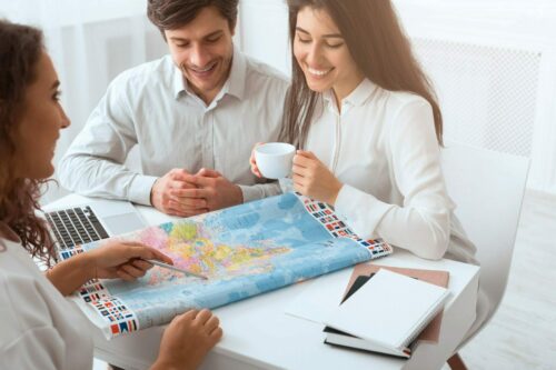 Plan,Journey.,Happy,Couple,Choosing,Place,For,Vacation,Using,Map