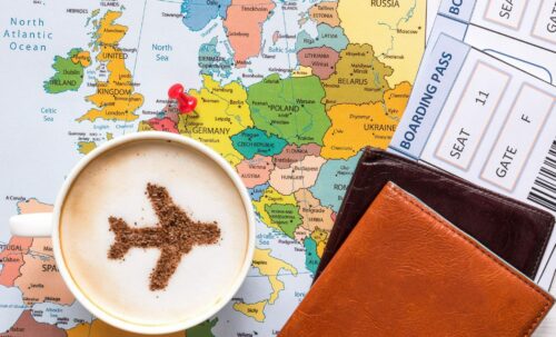 Airplane,Made,Of,Cinnamon,In,Cappuccino,,Passports,,Europe,Map,And
